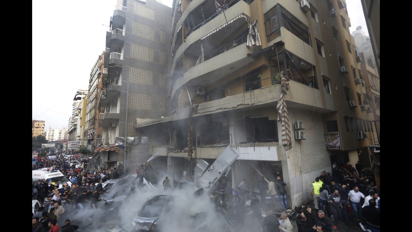 People gather at the site of the explosion. The blast was strong enough to be felt in nearby neighborhoods, reported Lebanon's state-run National News Agency.