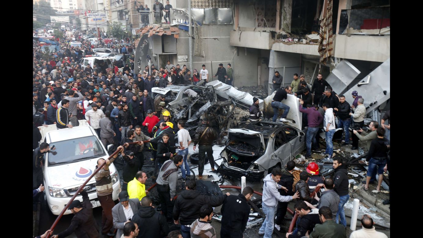 People search for victims at the scene of the bombing. 