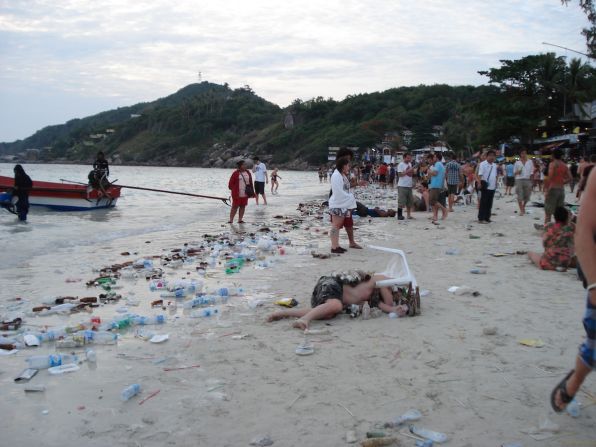 A scene in the documentary "Gringo Trails" shows the litter-strewn aftermath of a tourists' full moon party on Haad Rin, Koh Pha Ngan, Thailand.