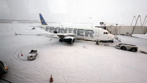 An airplane waits for passengers at O'Hare International Airport in Chicago on January 2.