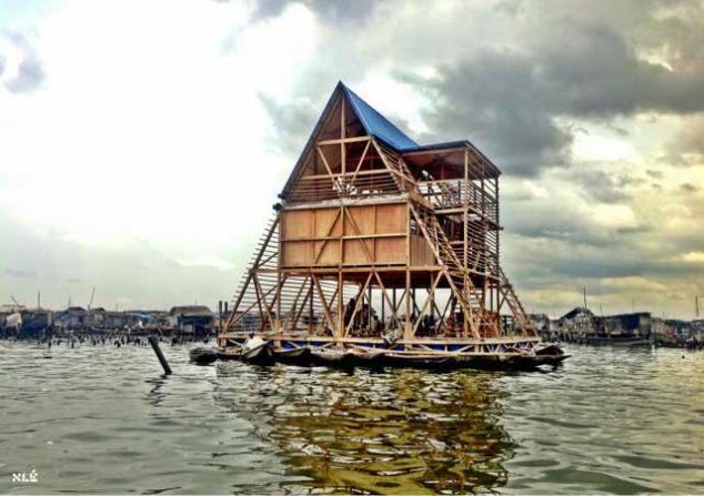 This prototype was constructed to provide teaching facilities for the slum district of Makoko, a former fishing village on Lagos Lagoon where over 100,000 people live in houses on stilts. Shortlisted for a <a href="index.php?page=&url=https%3A%2F%2Fdesignmuseum.org%2Fexhibitions%2Ffuture-exhibitions%2Fdesigns-of-the-year" target="_blank" target="_blank">Designs of the Year Award</a> in 2014, the school was built by a team of local residents, but was decommissioned in March 2016 and eventually collapsed following heavy rains. 