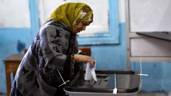 An Egyptian woman casts her ballot at a polling station during the second round of a referendum on a new draft constitution in Giza, south of Cairo, on December 22, 2012. Egyptians are voting in the final round of a referendum on a new constitution championed by President Mohamed Morsi and his Islamist allies against fierce protests from the secular-leaning opposition. AFP PHOTO/MAHMUD HAMS (Photo credit should read MAHMUD HAMS/AFP/Getty Images)