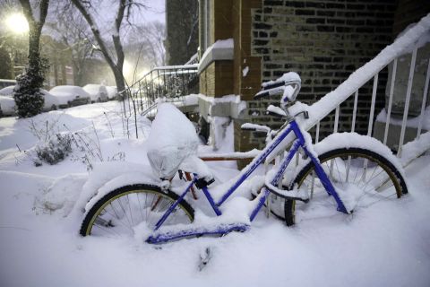 Snow covers bikes along Leavitt Street in Chicago's Wicker Park on January 2.