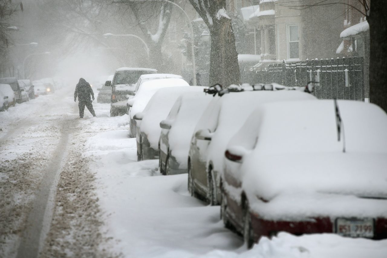 Snow covers cars in Chicago's Humboldt Park neighborhood on January 2.