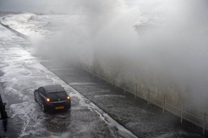 Waves break over the Saltcoats Esplanade on January 3.