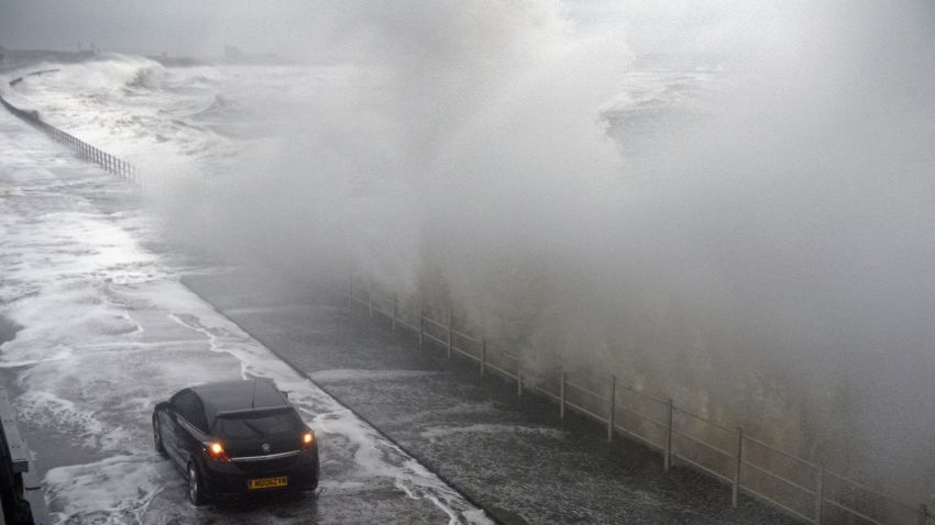 Waves break over the Saltcoats Esplanade on January 3 in Saltcoats, Scotland.