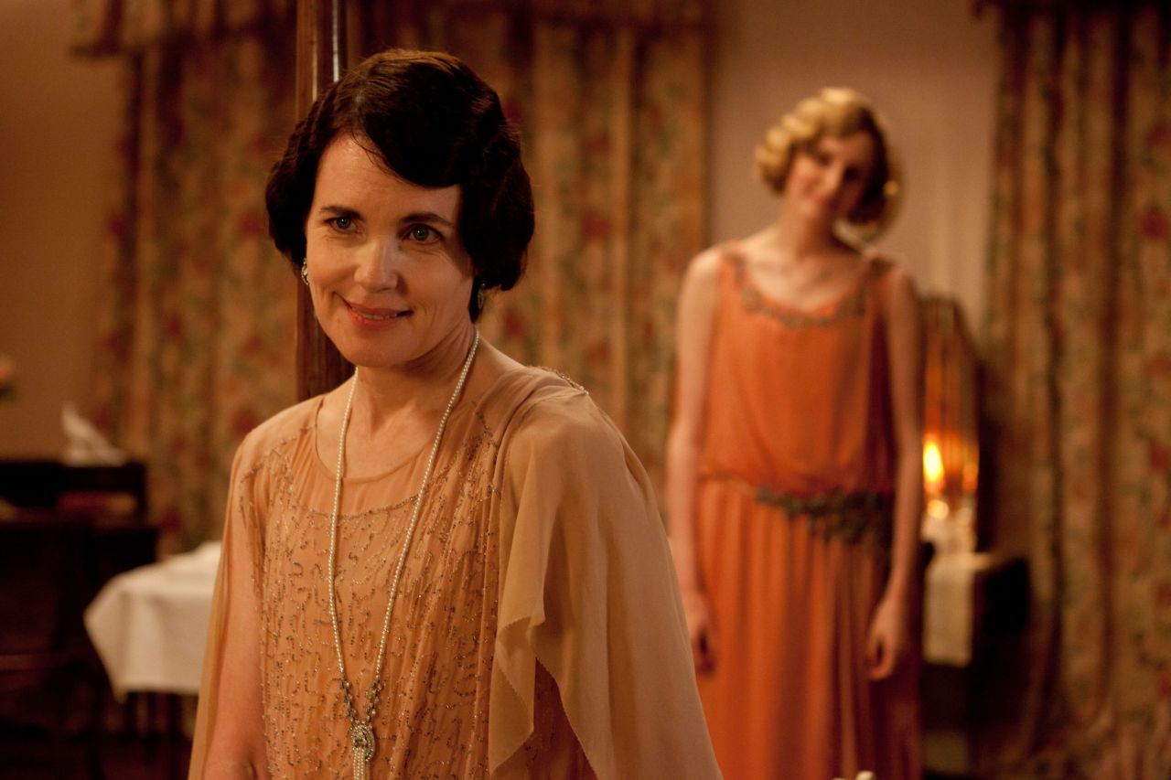 Cora (Elizabeth McGovern) plays Lady Grantham, whose kind-heartedness is a counterpart to Robert's bluster. 