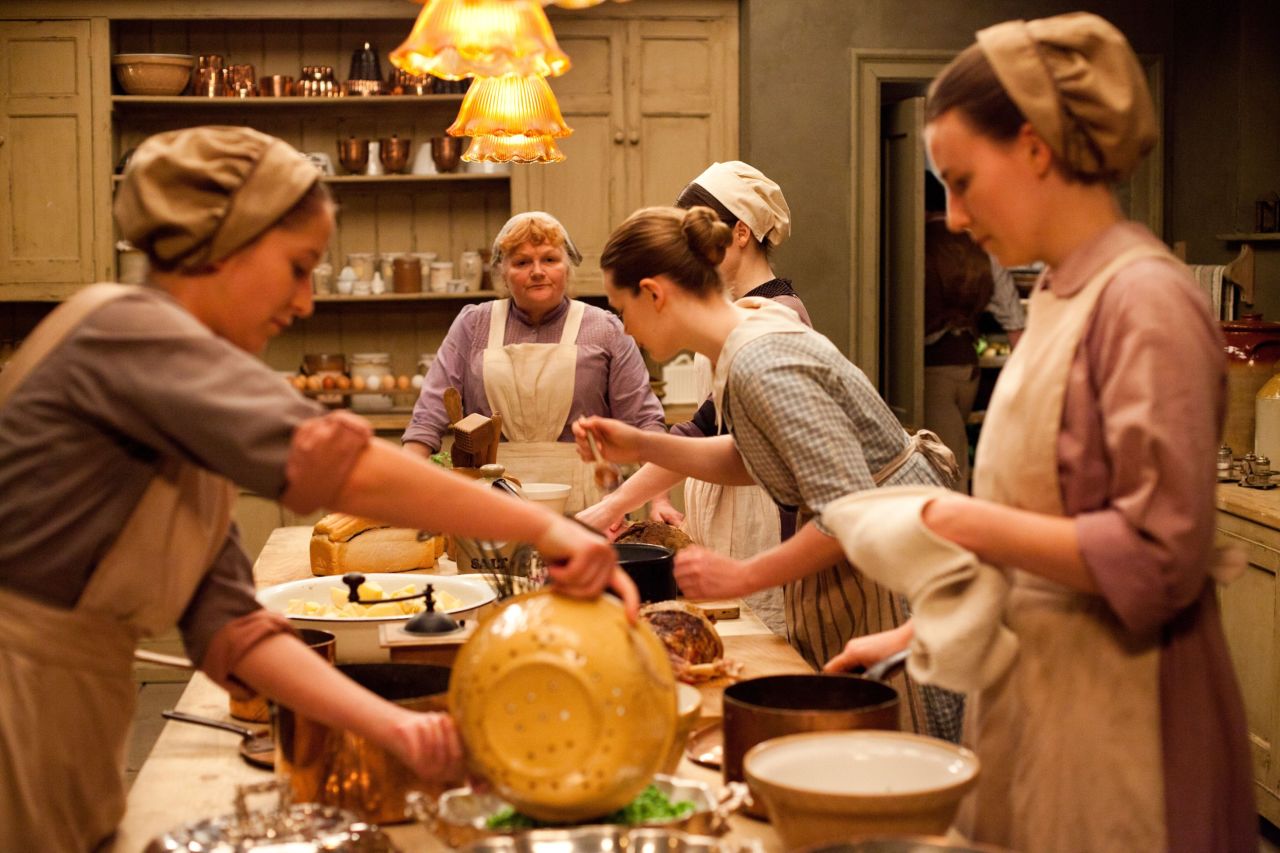 Head cook Mrs. Patmore (Lesley Nicol, rear) has her hands full in the kitchen as always.