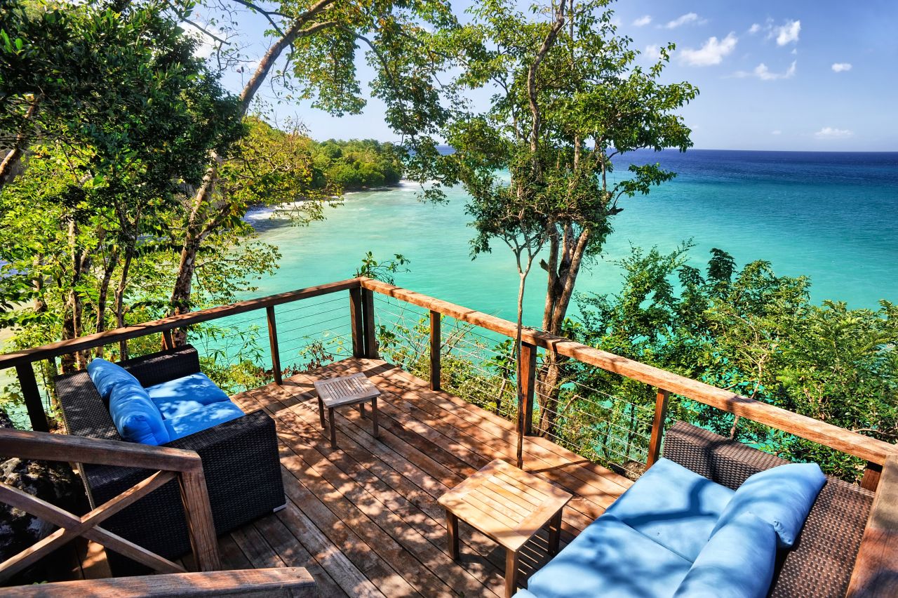 At Secret Bay in Dominica guests stay in one of five tree house-style villas and bungalows.