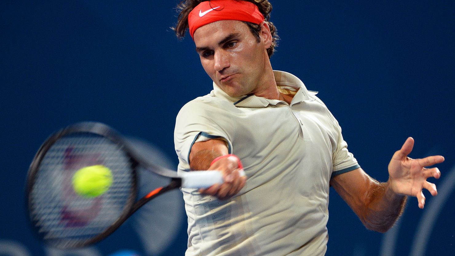 Roger Federer powers a forehand during his imperious victory over Marinko Matosevic in Brisbane.