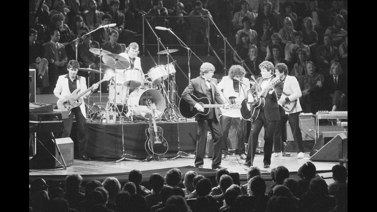 The Everly Brothers and their band performing at their reunion concert at the Royal Albert Hall, London, in September 1983. From left, Mark Griffiths, Graham Jarvis, Phil Everly, Albert Lee, Don Everly and Martin Jenner.