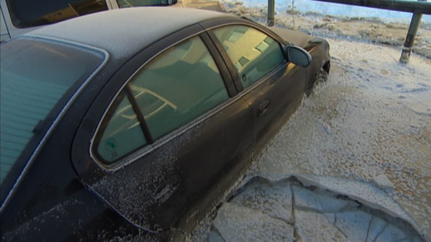 cars frozen to ground in canada