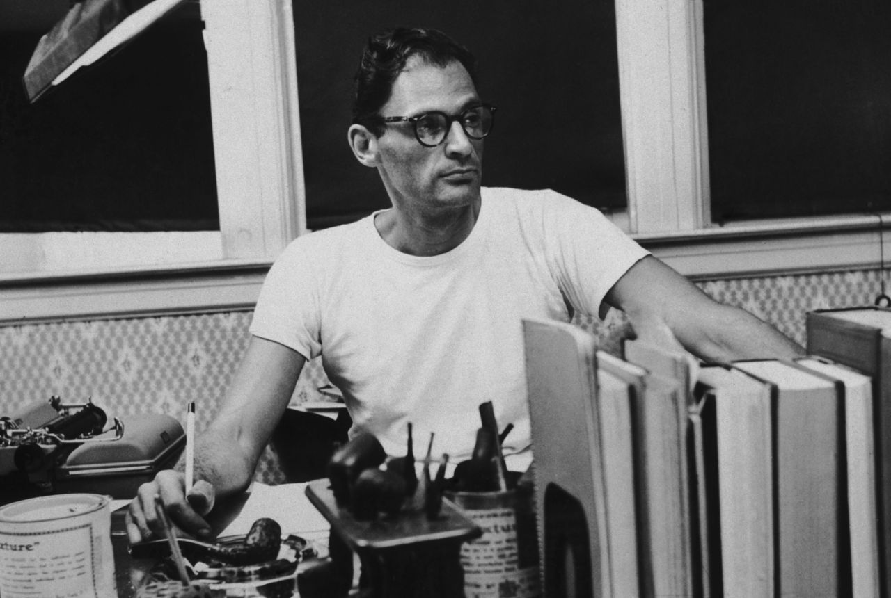 Playwright Arthur Miller, creator of "Death of a Salesman" and "The Crucible," is seen at his desk circa 1955.