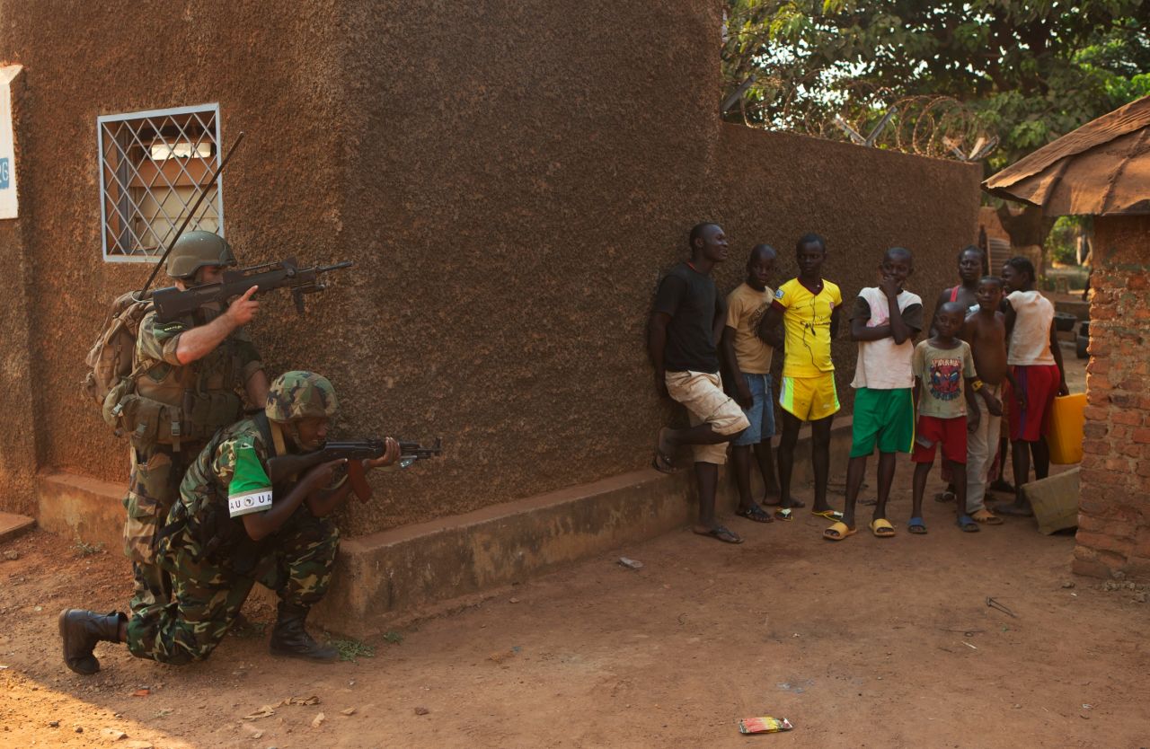 A French soldier and an African Union peacekeeper from Burundi patrol the Galabadja district of Bangui on Saturday, January 4. While insecurity continued to reign in many areas of the city, certain neighborhoods were tentatively reopening and some residents returning, at least during daylight hours. 