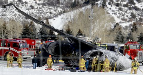 Emergency crews respond to the scene of a small plane that crashed upon landing at the Aspen-Pitkin County Airport in Aspen, Colorado, on Sunday, January 5.
