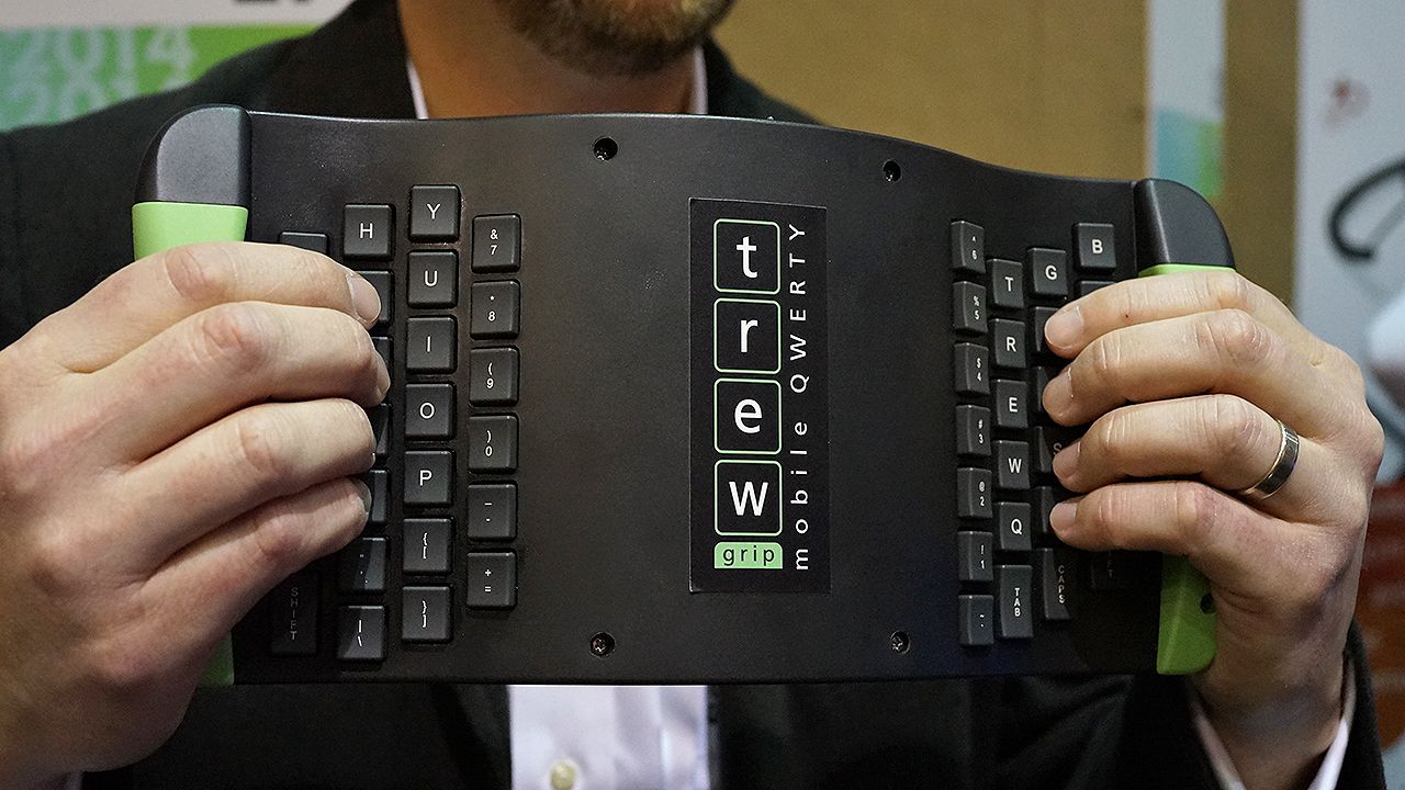 The Mobile QWERTY keyboard from TrewGrip flips and rotates the traditional keyboard. It works with tablets, phones and laptop computers. 