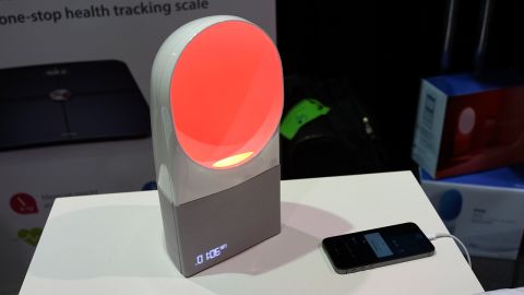 The Aura is a smart communications lamp from Withings that communicates with a sensor placed in your bed to track sleep patterns and wake you at just the right moment.