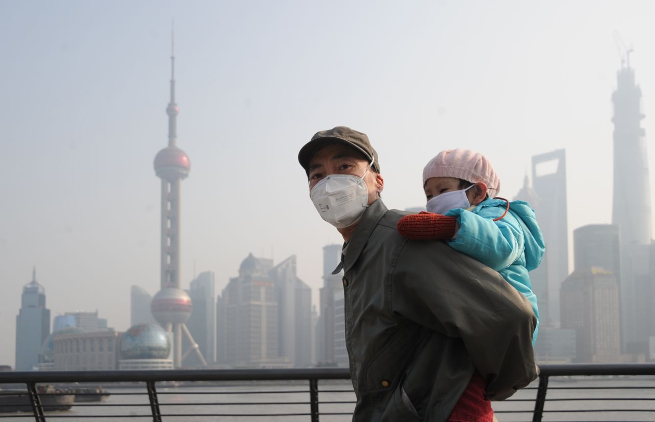 Face masks that protect against the smog are de rigueur for both a morning stroll ..... 