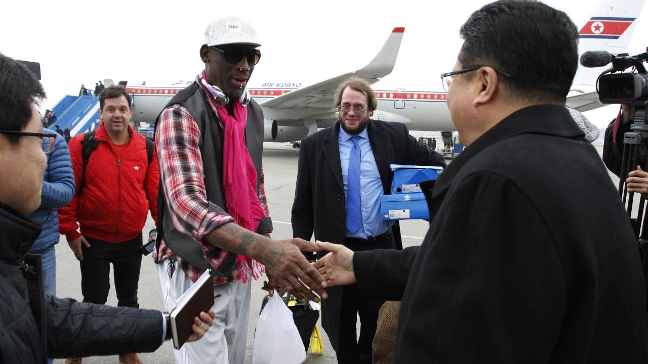 Son Kwang Ho, vice minister of North Korea's Sports Ministry, greets Rodman at the airport in Pyongyang in January 2014.