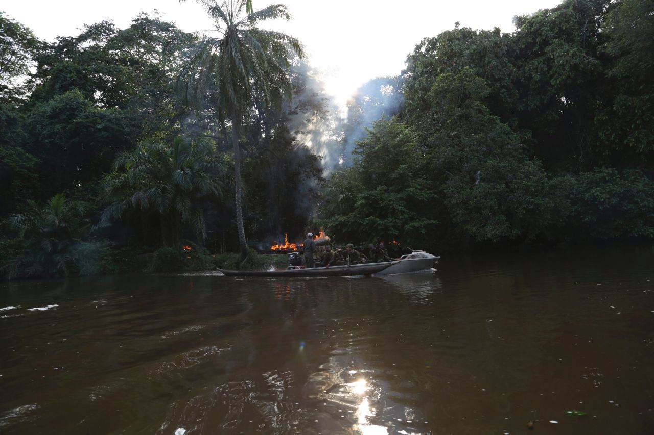 Odzala Park's Eco Unit heads back out on the river after torching an active poacher's camp. The team finds four guns, one of which Eckel says is military issue. Of all of the weapons the unit has in its stockpile -- a combination of those handed over in the amnesty program and those seized in raids -- the majority come from military stock.