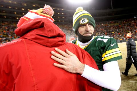 Packers quarterback Aaron Rodgers wore long sleeves and a balaclava in a bid to stave off the cold.