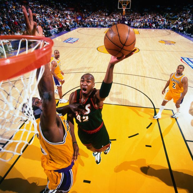 Vin Baker shoots the basketball during a 1998 playoff game in Los Angeles. Baker is one of seven former NBA players taking part in the game in North Korea, according to Rodman's agent, Darren Prince. Baker was a four-time NBA All-Star who averaged 15 points a game during a 13-year career that ended in 2006.