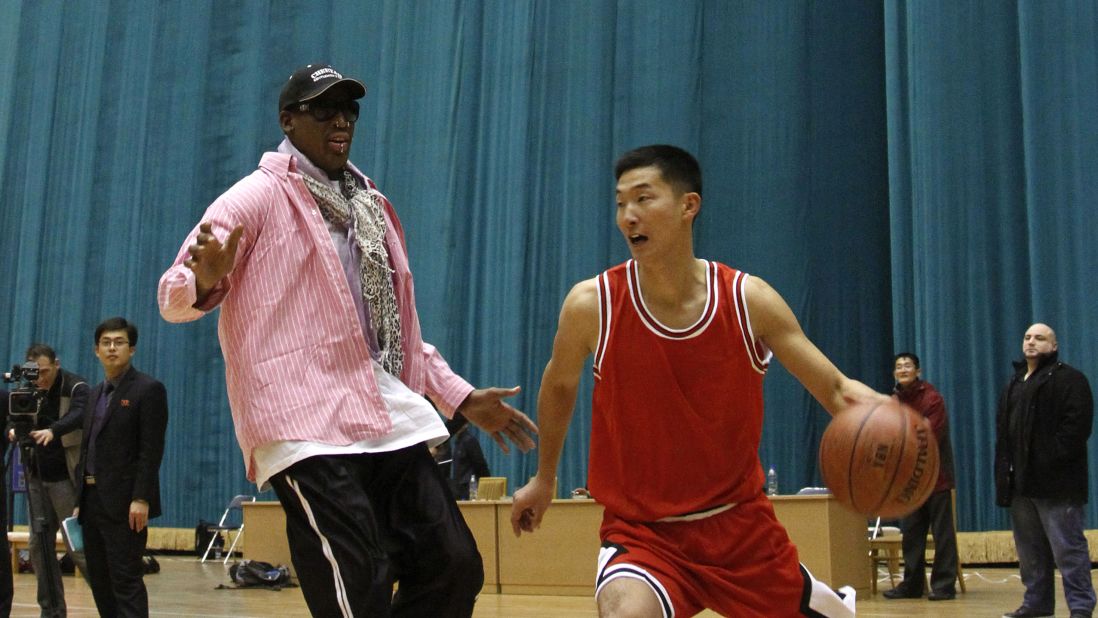 Former basketball star Dennis Rodman plays one-on-one with a North Korean player during a practice session in Pyongyang, North Korea, on December 20, 2013. Rodman and several other former NBA players have arrived in North Korea to take part in a basketball game on Wednesday, January 8, the birthday of North Korean leader Kim Jong Un.