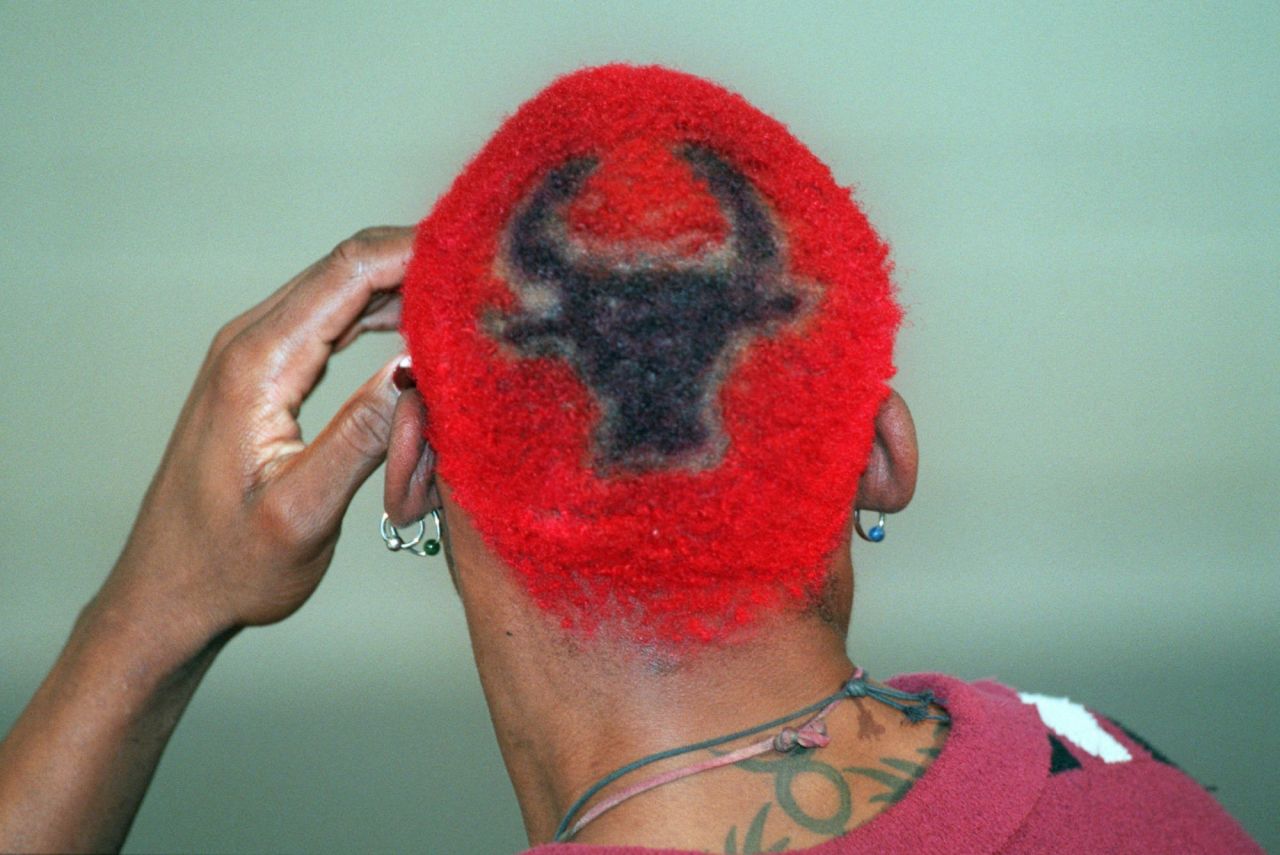 During his Hall of Fame basketball career, Dennis Rodman was known for his flashy looks on and off the court. Here, Rodman sports the logo of the Chicago Bulls, who he won the NBA title with in 1996, 1997 and 1998.