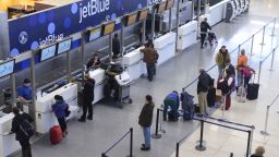 JetBlue passengers wait for normal flights to resume at Logan International Airport in Boston on January 7.