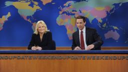SATURDAY NIGHT LIVE -- Episode 22 -- Pictured: (l-r) Amy Poehler, Seth Meyers during the "Weekend Update" skit on May 16, 2009  (