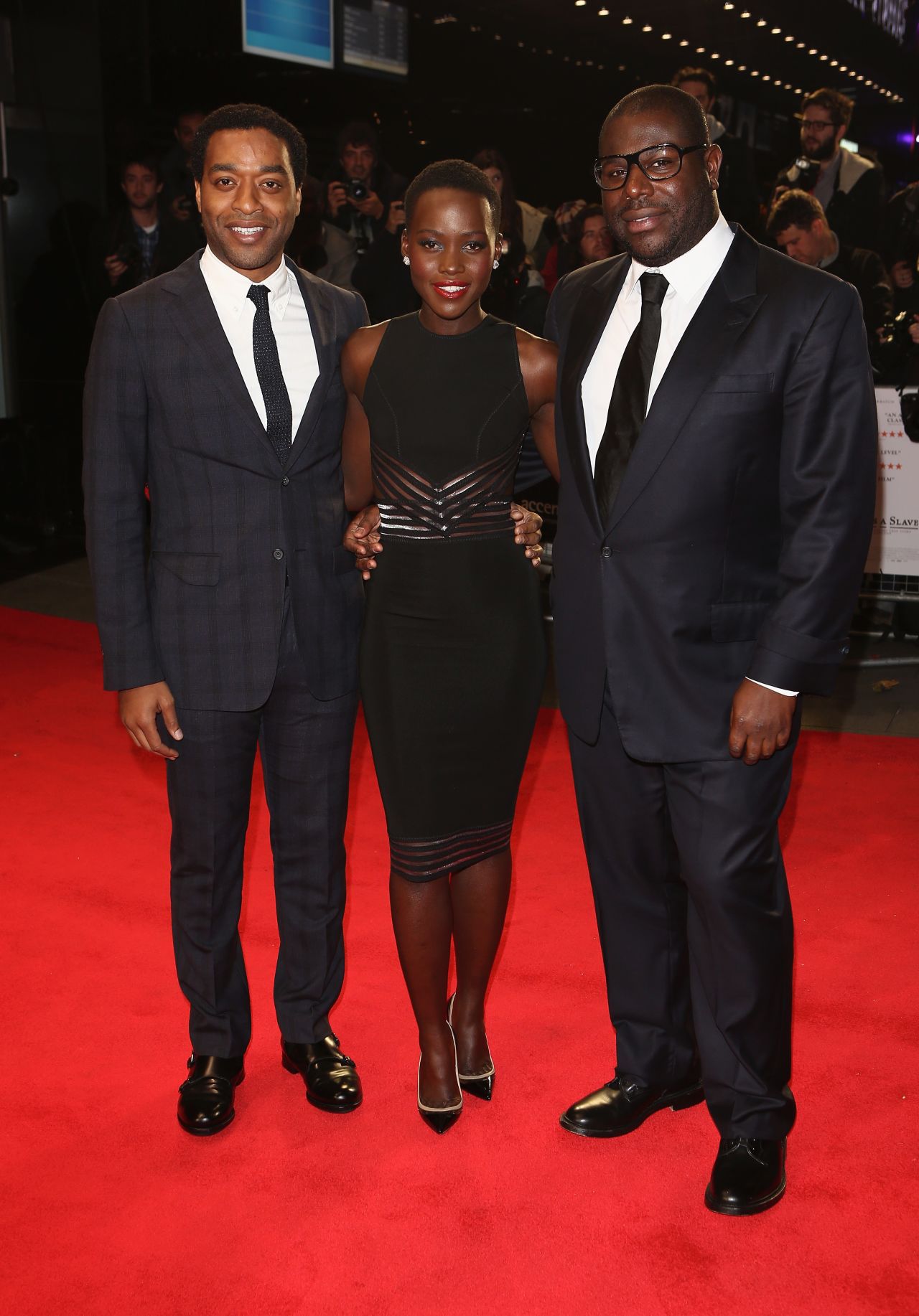 Nyong'o pictured with "12 Years" star Chiwetel Ejiofor (left) and director Steve McQueen (right) at the movie's European premiere, at the London Film Festival on October 18, 2013.