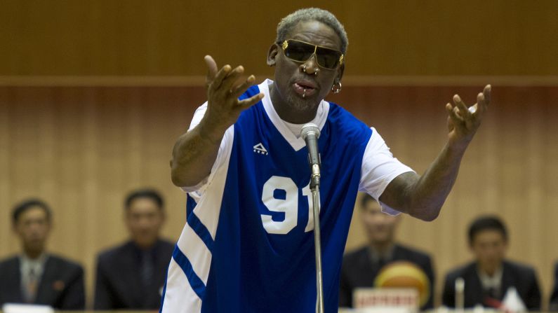 Dennis Rodman sings "Happy Birthday" to North Korean leader Kim Jong Un before an exhibition basketball game in Pyongyang, North Korea, on Wednesday, January 8. In his latest round of "basketball diplomacy," Rodman made his fourth visit to North Korea, one of the world's most totalitarian states, to participate in a basketball game between a team of North Koreans and <a href="index.php?page=&url=http%3A%2F%2Fwww.cnn.com%2F2014%2F01%2F06%2Fpolitics%2Fgallery%2Fnba-in-north-korea%2Findex.html" target="_blank">a team of former NBA players</a>.