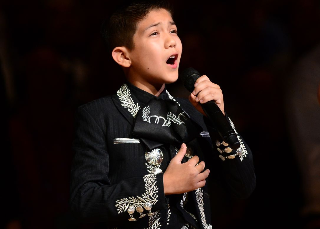 Sebastien De La Cruz, known as San Antonio's Little Mariachi, sang the national anthem before an NBA finals game between the San Antonio Spurs and the Miami Heat in 2013. When <a href="http://www.cnn.com/2013/06/12/us/mexican-american-boy-sings-anthem/">some questioned his citizenship</a> and mariachi outfit, it sparked defense of the young singer from notables such as actress <a href="http://www.cnn.com/2013/06/14/us/mexican-american-boy-encore/">Eva Longoria</a>.