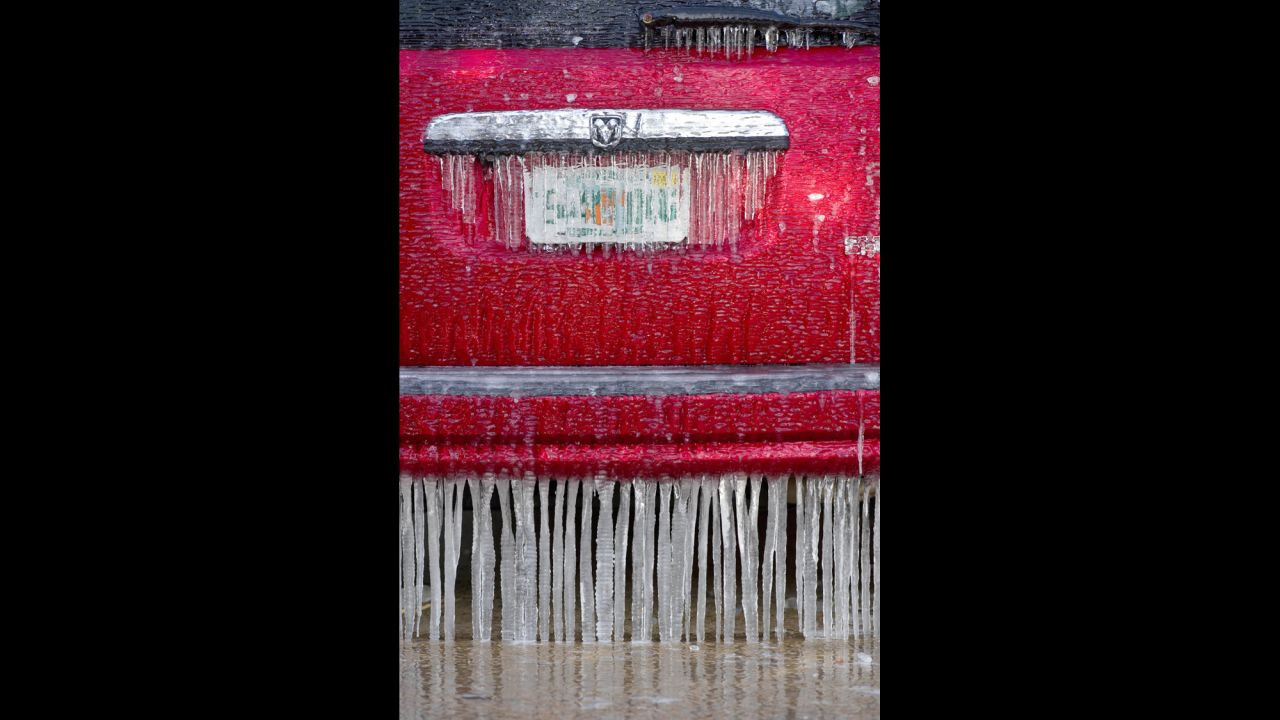 Icicles hang from the bumper of a vehicle in Fort Walton Beach, Florida, on Tuesday, January 7.