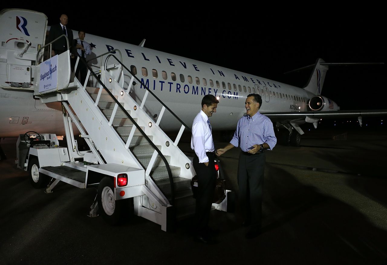 Mitt Romney (right) and running mate Paul Ryan stand outside the 1970 DC-9-32 aircraft. 