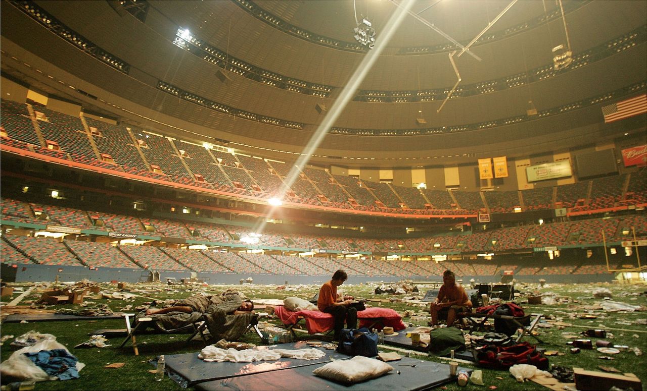 In 2005, displaced victims of Hurricane Katrina rest inside a shelter set up at the Superdome in New Orleans. Advocacy groups estimate homelessness in the city more than doubled in the aftermath of the storm. The disaster fueled dialogue on poverty and race relations in America.