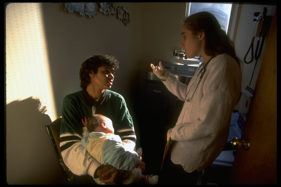 A Medicaid recipient brings her daughter to a hospital in 1995. Medicaid, a federally run health program, was designed to provide coverage for low-income and disabled individuals.