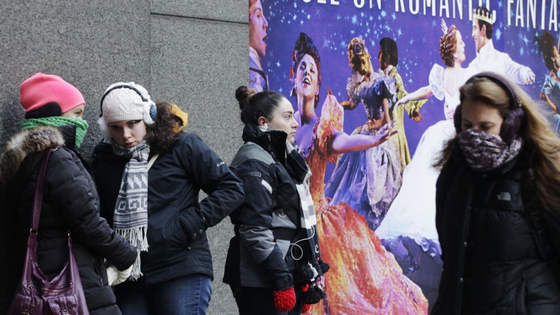 People wait outside the Broadway Theatre in New York City to buy tickets for the show "Cinderella" on January 8.