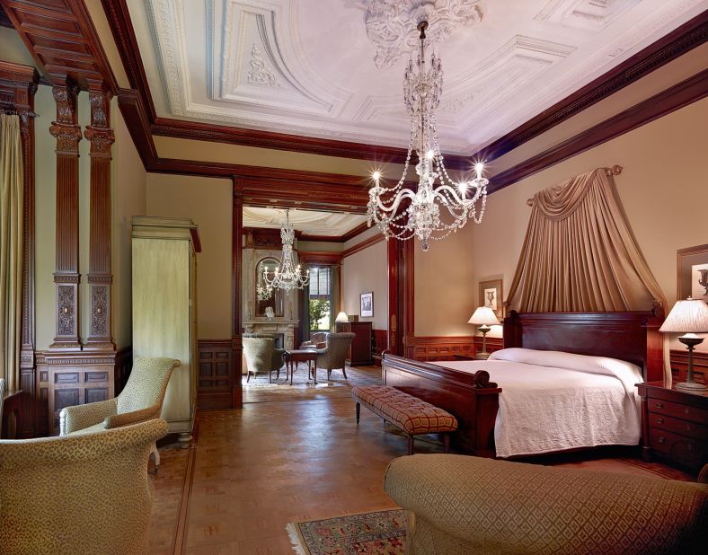 The two-room Grand Mansion Suite is lit by two original Italian chandeliers and has two marble gas fireplaces.