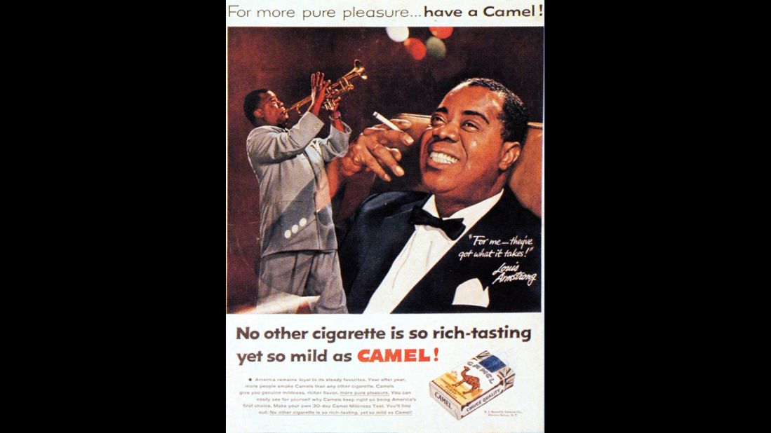 Jazz legend Louis Armstrong appears in an advertisement for Camel cigarettes.
