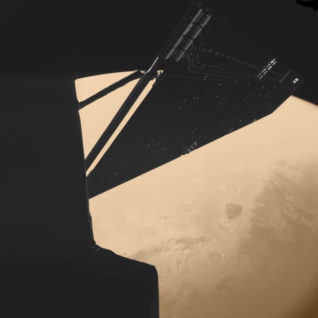 This image was taken by an instrument on Rosetta's Philae lander just minutes before the spacecraft made its closest approach to Mars. Part of Rosetta and its solar arrays are visible.