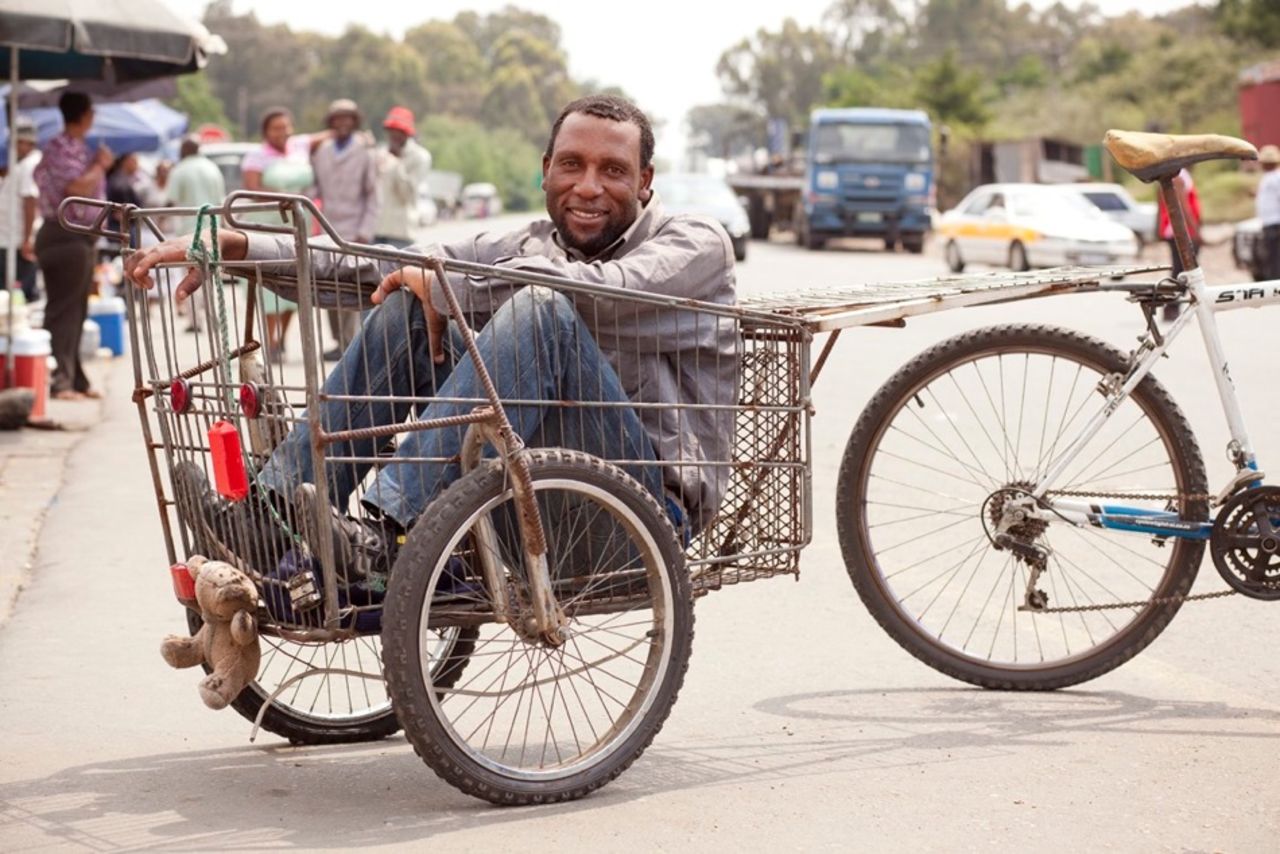 "It's because of this bicycle that I am able to make money, so if you are going to give me more, I want it. I am a Mosotho and I hustle with this wagon. There are no jobs so I have made this my job. I take tourists' luggage inside the wagon and it helps me to make a living."