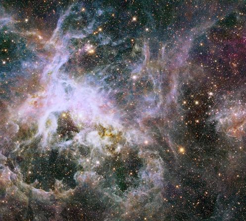 Hubble scientists say this is the best-ever view of the Tarantula Nebula, which is located in one of our closest galactic neighbors, the Large Magellanic Cloud.