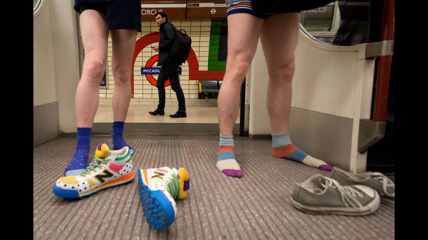 Participants in the 13th "No Pants Subway Ride" travel on an Underground train in London on Sunday, January 12. The annual event first <a href="http://improveverywhere.com/missions/the-no-pants-subway-ride/" target="_blank" target="_blank">started in New York City</a> in 2002, when one pantsless participant boarded a subway at each of seven consecutive stops, claiming to have forgotten his pants. Since then, cities all over the world have seen bare-legged patrons on subways.