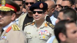 Egypt's General Abdel Fattah el-Sisi attends the funeral of Giza security chief Nabil Farrag in the district of Giza, on the outskirts of Cairo, on September 20, 2013.