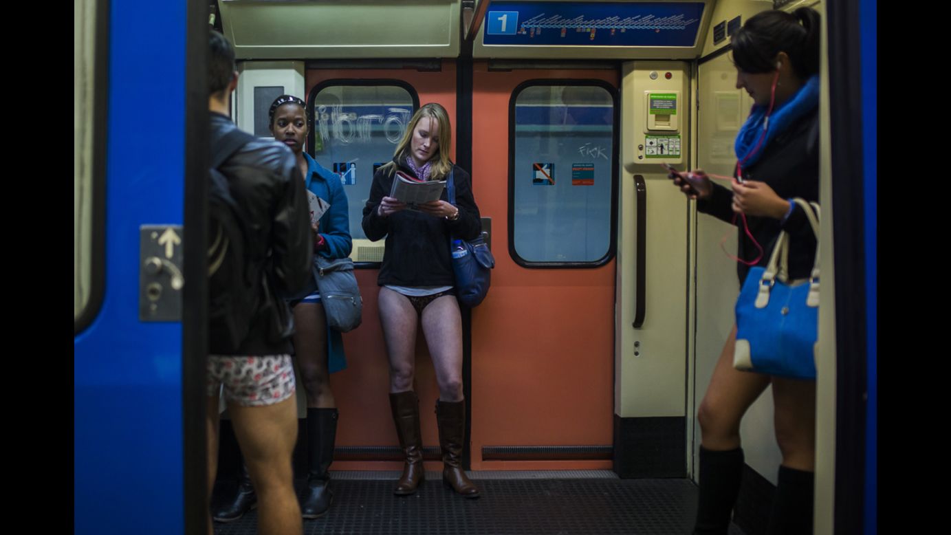 Participants travel without their pants in Madrid.