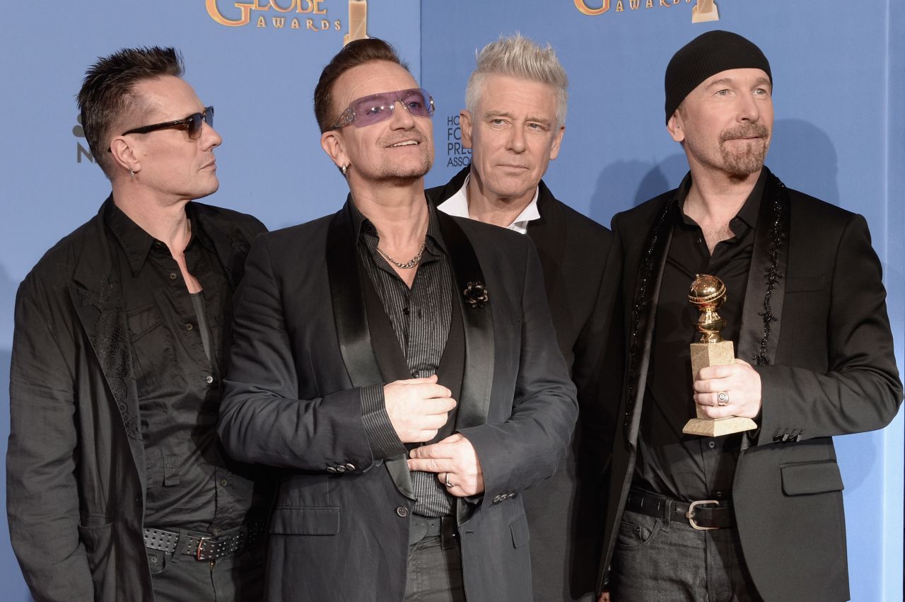 U2 canceled a weeklong gig on "The Tonight Show with Jimmy Fallon" in November 2014 after frontman Bono, second from left, injured his arm while bicycling in New York City.