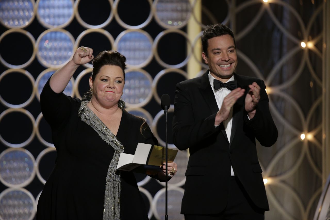 Melissa McCarthy and Jimmy Fallon present the award for best actor in a miniseries or TV movie. It was won by Michael Douglas for his performance in the HBO movie "Behind the Candelabra."