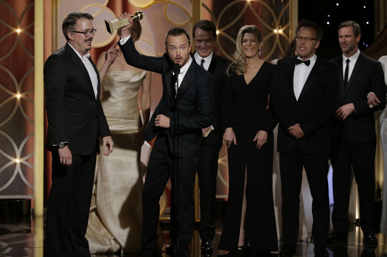 Vince Gilligan, left, and the cast of "Breaking Bad" accept the award for best TV series in the drama category.