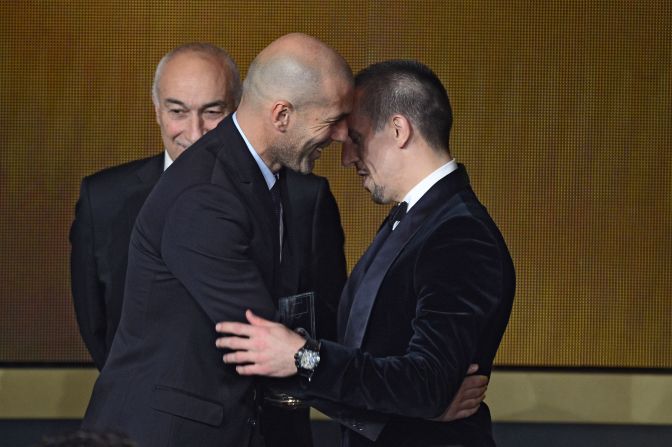This was not a repeat of Zinedine Zidane's headbutt in the 2006 World Cup, but a warmer embrace as the Frenchman hands Bayern Munich's Franck Ribery his FIFA/FIFPro World XI award. Once tipped to win the main prize itself, Ribery eventually finished third despite winning five major trophies in 2013.